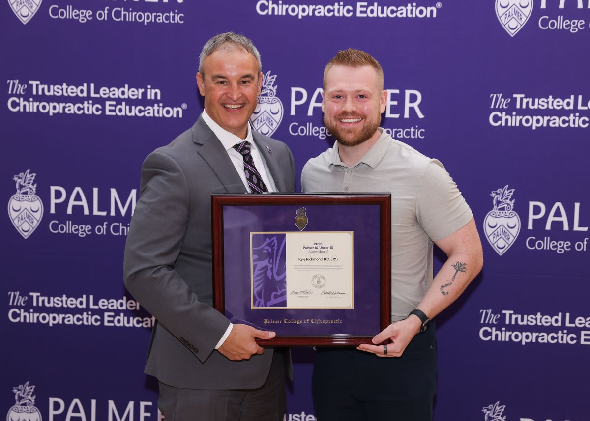 Dr. Kyle Richmond receiving the Palmer 10 Under 10 Alumni Award